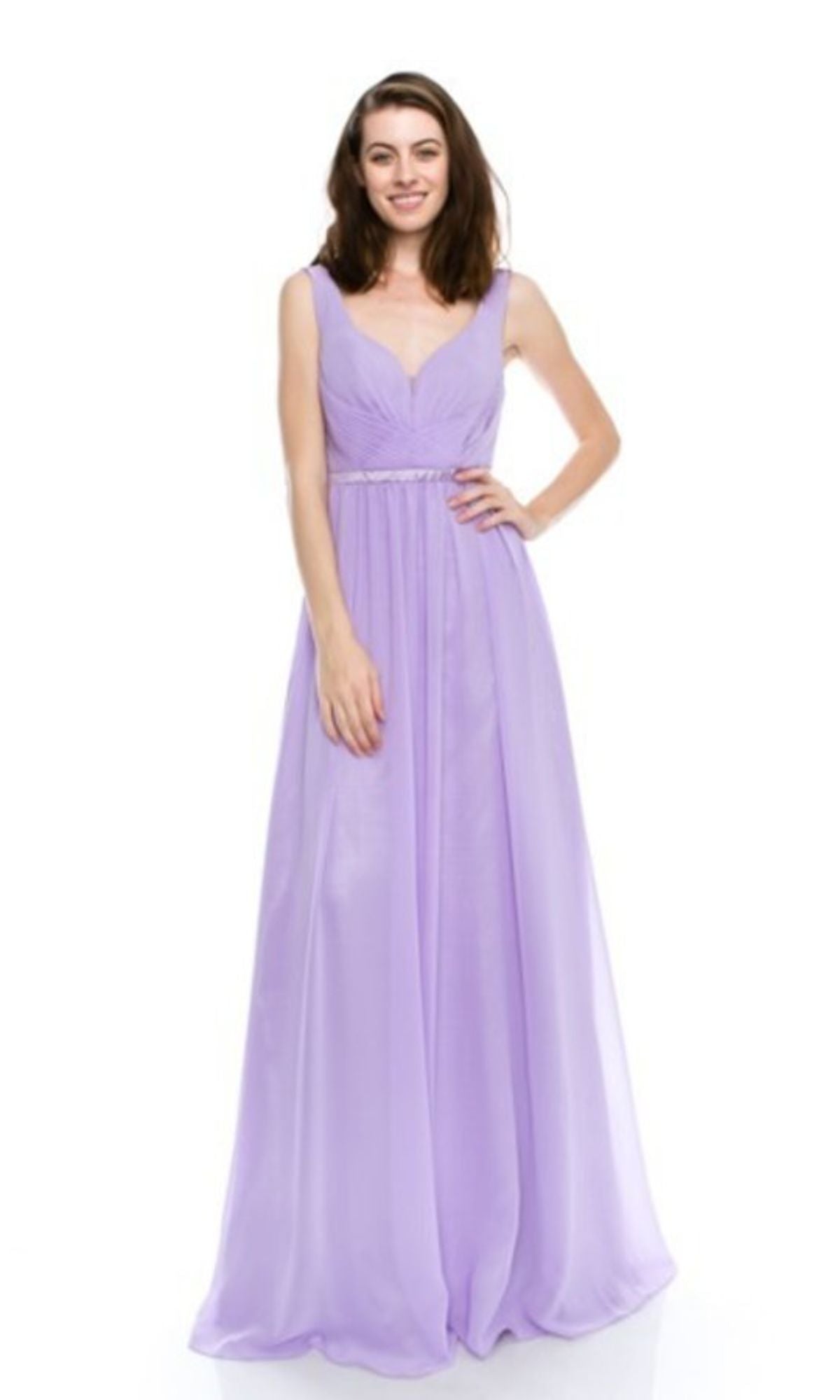 A woman stands against a white background wearing the Chicas C7818 Deep V-Back Long A-Line Prom Dress, featuring a sleeveless design, floor-length lavender fabric, a V-neckline, and a fitted waist.